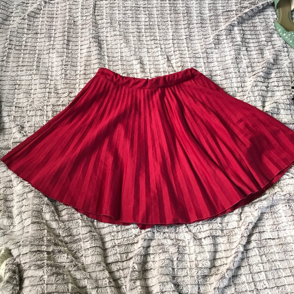 Red pleated skirt